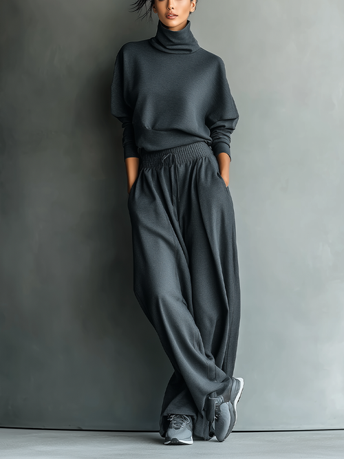 Completo da donna in maglia di carbone con collo alto e pantaloni a gamba larga